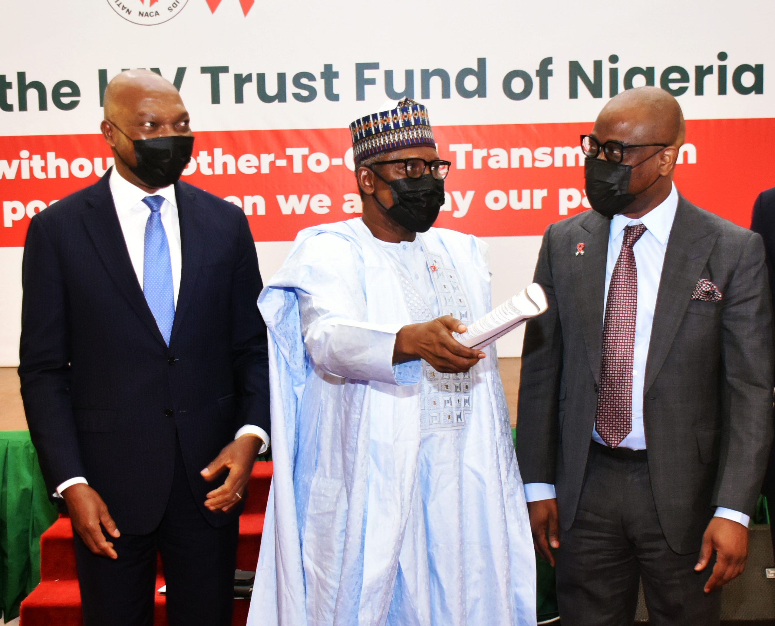 PIC 2 From left: Chairman, Shell Group of Companies in Nigeria, Mr Osagie Okunbor; Chairman, Dangote Group of Companies, Alhaji Aliko Dangote; CEO Access Bank Plc, Dr Herbert Wigwe, during the launch of the HIV Trust Fund of Nigeria at the Presidential Villa in Abuja on Tuesday (1/2/2022)
/1/2/2022/Callistus Ewelike/NAN