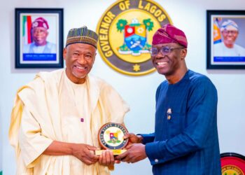 Lagos State Governor, Babjide Sanwo-Olu presents souvenir to Polaris Bank's Board Chairman, Mr. Mohammed K. Ahmad when the Bank's Board and Executive Management paid a courtesy visit to Lagos State Governor, Babjide Sanwo-Olu at Lagos House, Marina on Wednesday.