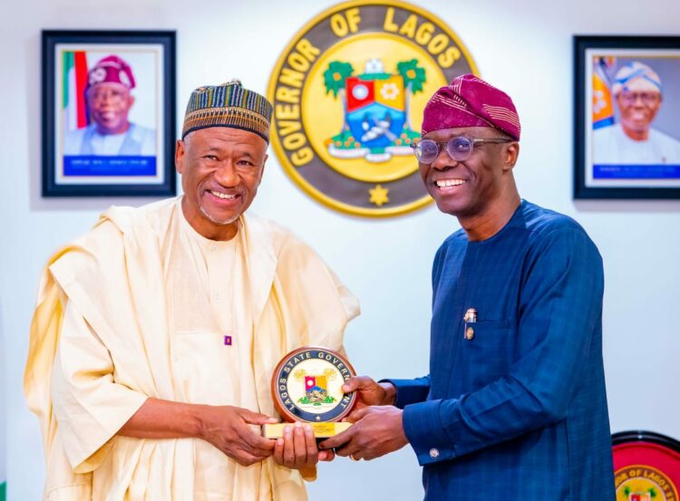 Lagos State Governor, Babjide Sanwo-Olu presents souvenir to Polaris Bank's Board Chairman, Mr. Mohammed K. Ahmad when the Bank's Board and Executive Management paid a courtesy visit to Lagos State Governor, Babjide Sanwo-Olu at Lagos House, Marina on Wednesday.