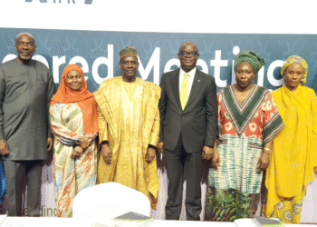 EGM: From left: Mr. Usman Abdulkadir, Executive Director, Risk Management and Compliance; Mr. Sam Okagbue, Non-Executive Director; Hajiya Yabawa Lawan Wabi, Non-Executive Director; Alhaji Hafiz Mohammed Bashir, Acting Chairman; Mr. Ebenezer Kolawole, Managing Director/CEO (Ag.); Prof. Iyabo Obasanjo, Non-Executive Director; Hajiya Halima Babangida, Non-Executive Director; and Mr. Alaba Williams, Company Secretary during the court-ordered meeting of Unity Bank Plc on the proposed merger with Providus Bank.