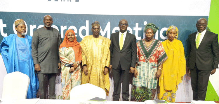 EGM: From left: Mr. Usman Abdulkadir, Executive Director, Risk Management and Compliance; Mr. Sam Okagbue, Non-Executive Director; Hajiya Yabawa Lawan Wabi, Non-Executive Director; Alhaji Hafiz Mohammed Bashir, Acting Chairman; Mr. Ebenezer Kolawole, Managing Director/CEO (Ag.); Prof. Iyabo Obasanjo, Non-Executive Director; Hajiya Halima Babangida, Non-Executive Director; and Mr. Alaba Williams, Company Secretary during the court-ordered meeting of Unity Bank Plc on the proposed merger with Providus Bank.