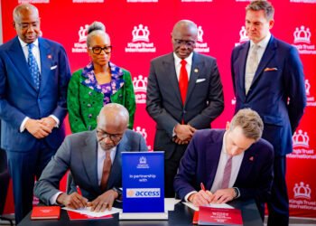 L-R: (Sitting) Roosevelt Ogbonna, Managing Director/CEO, Access Bank Plc, and Will Straw, CBE, CEO, King’s Trust International. (Standing)
Aigboje Aig-Imoukhuede, Co-Chair, King’s  Trust International Africa Advisory Board and Chairman, Access Holdings Plc; Ofovwe Aig-Imoukhuede, Co-Chair, King’s Trust International Africa Advisory Board; Lagos State Governor, Babajide Sanwo-Olu, and  Tom Hartley, Assistant Private Secretary to HM The King, during the signing of partnership agreement between Access Bank and King’s Trust International in London, UK…yesterday